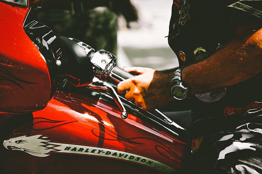 Close-Up Photo of Person Riding Harley Davidson Motorcycle, biker HD wallpaper