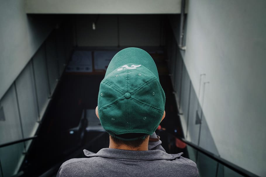 man wearing green cap, clothing, apparel, human, person, hat HD wallpaper