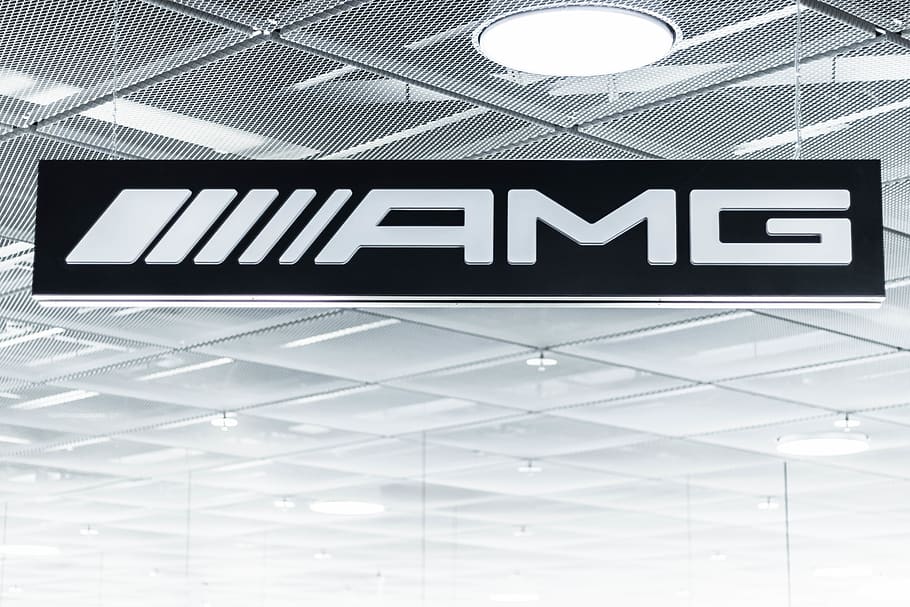 AMG logo, communication, text, western script, sign, indoors HD wallpaper