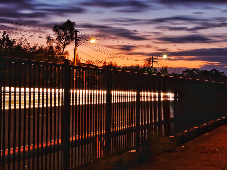 time lapse photography of red light, fence, railing, picket, sunlight, HD wallpaper