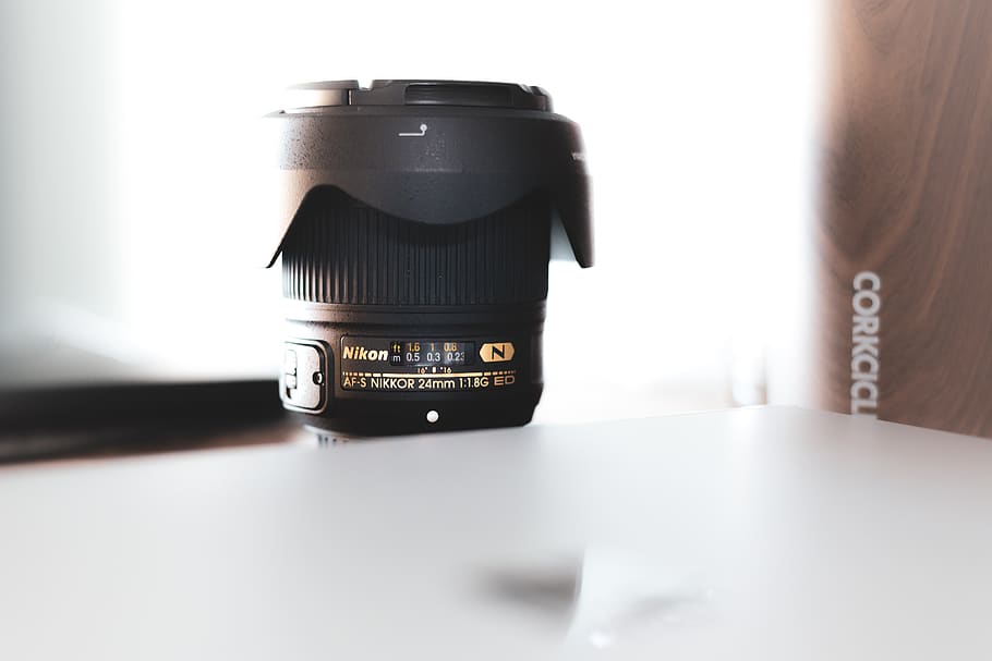 black Nikon camera zoom lens on table, electronics, camera lens HD wallpaper