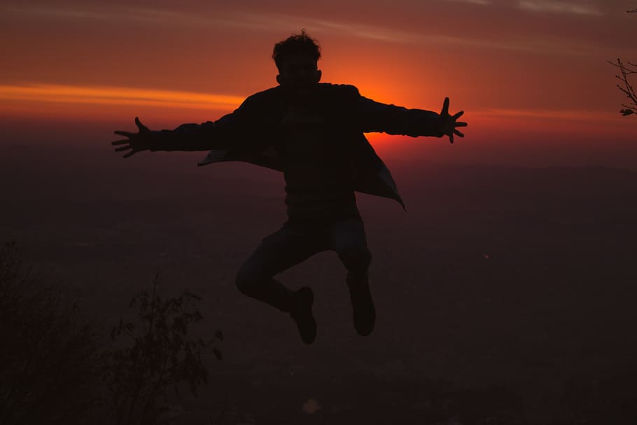 jump, sun, sunset, clothes, orange, boy, extreme, view, view through foliage HD wallpaper