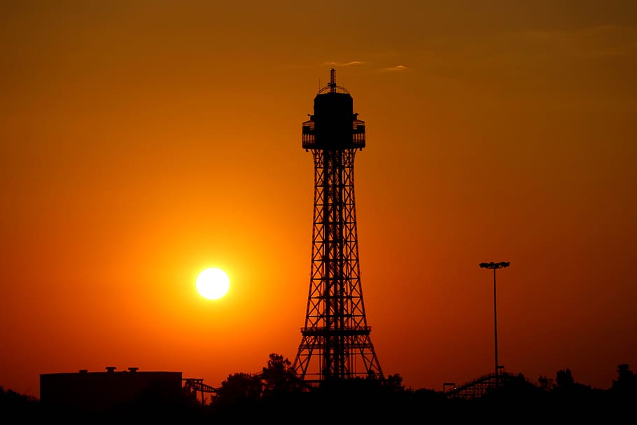 eiffel, tower replica, kings, island, sun, sunset, sky, orange color