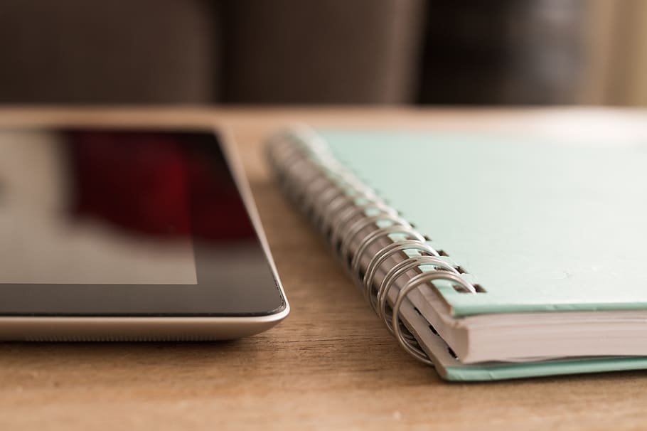 Black Tablet Computer Beside Teal Notebook, desk, ipad, notes HD wallpaper