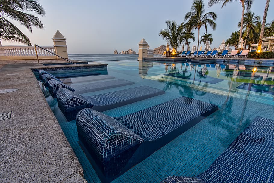 Blue Sun Loungers On Swimming Pool, cabo san lucas, dug-out pool, HD wallpaper