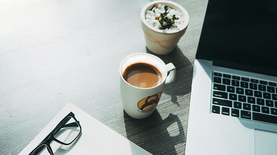 white ceramic mug beside eyeglasses, cup, coffee, drink, laptop HD wallpaper