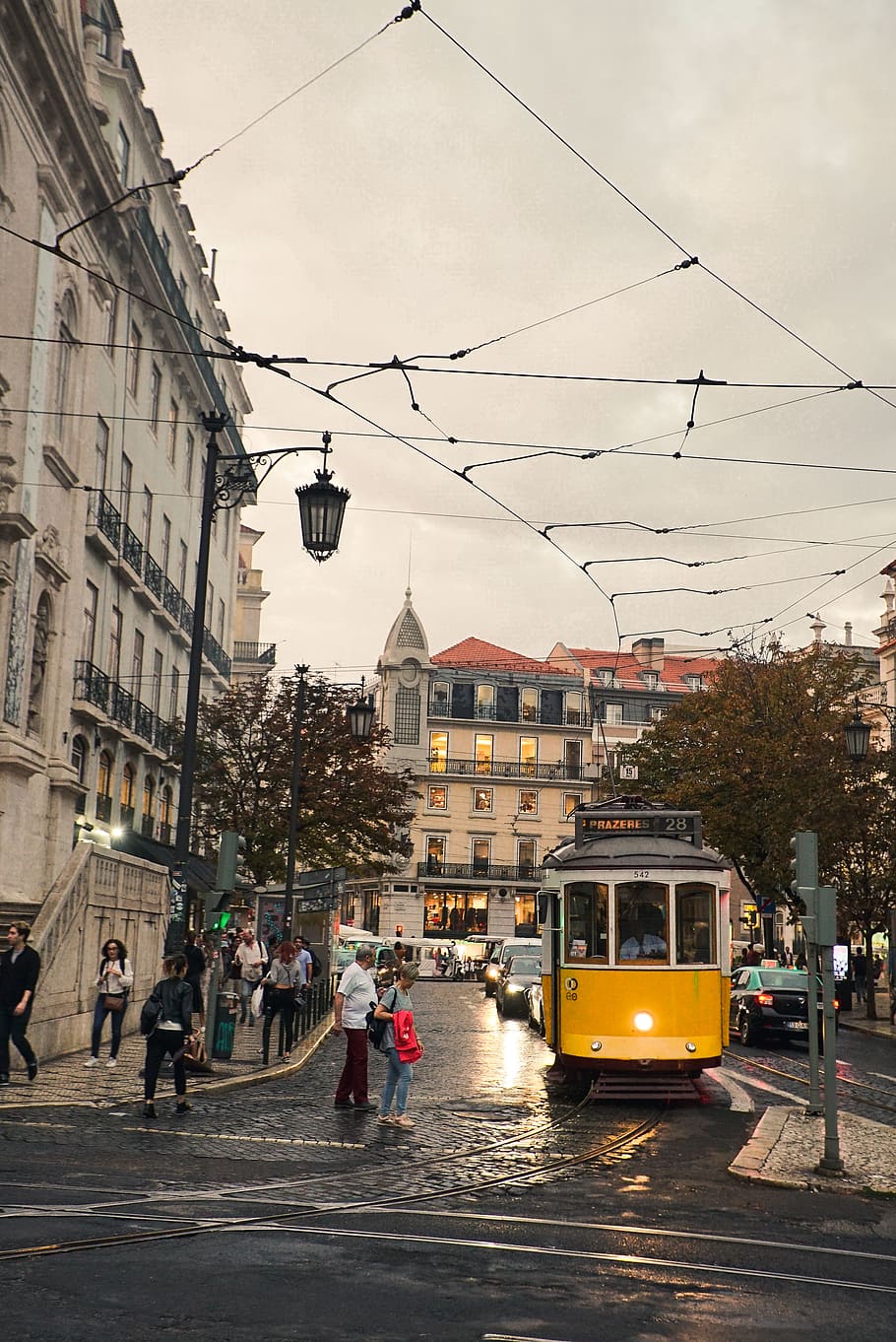 Yellow Tram in City Street, architecture, buildings, cables, downtown HD wallpaper
