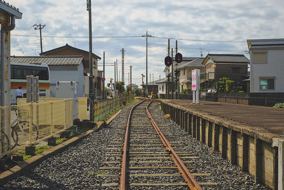 train's track between houses, rail, train track, transportation HD wallpaper