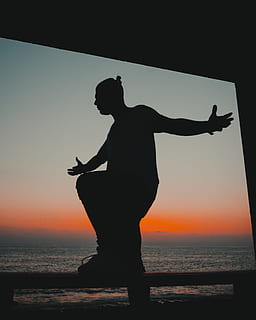 silhouette, man, beach, arms, outstretched, sunset, sunrise HD wallpaper