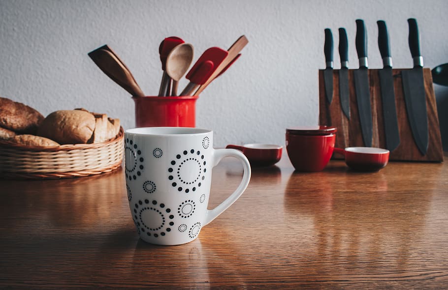Mug in Front of Breads Beside Spatulas on Table, cup, cutlery HD wallpaper