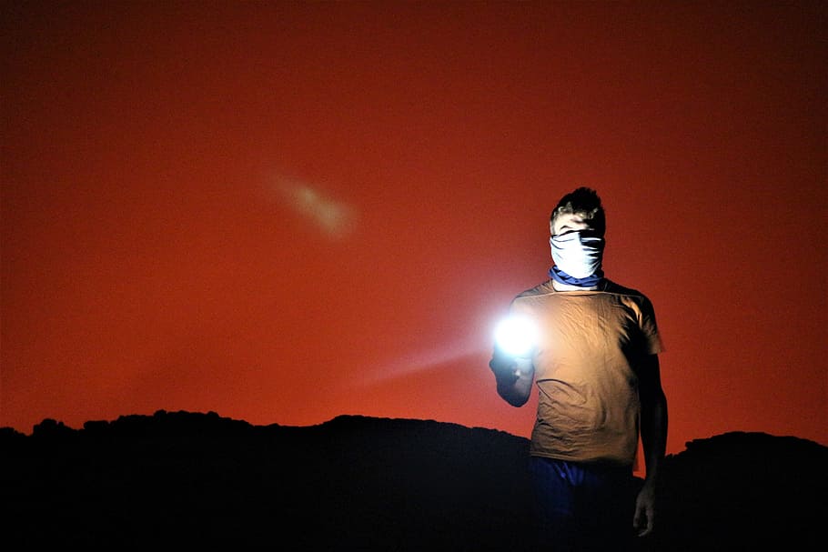 man holding flashlight, lavalake, red, red sky, face mask, cover HD wallpaper