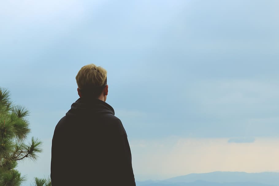 Man Wearing Black Jacket Standing Near Tree, back view, clouds HD wallpaper