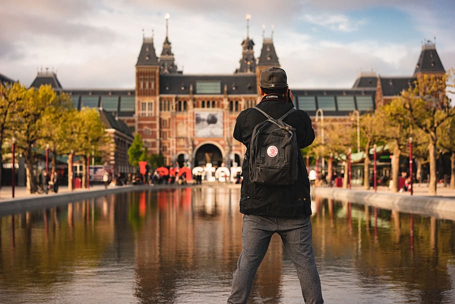 man standing in front pond, monument, building, water, tourist HD wallpaper