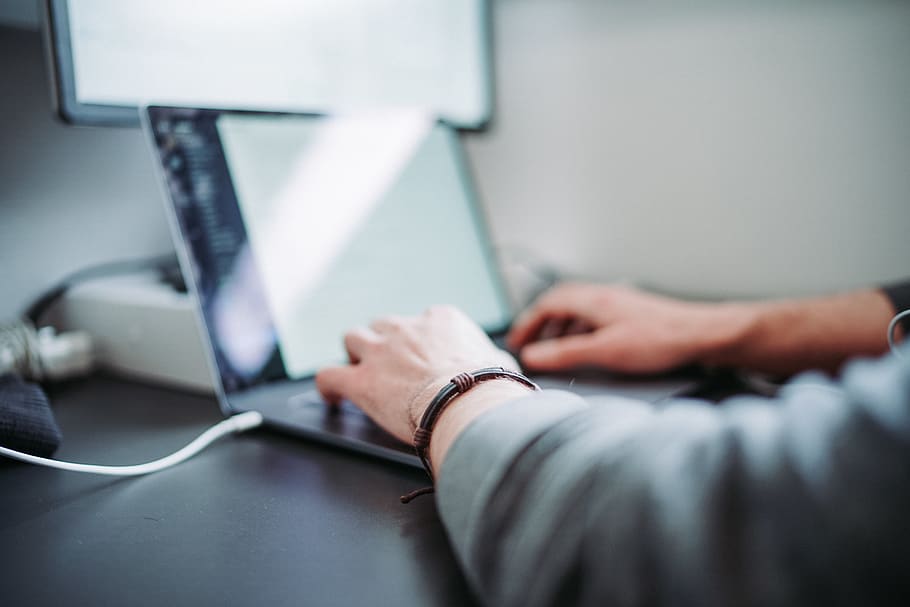 person using laptop, computer, technology, human hand, office HD wallpaper