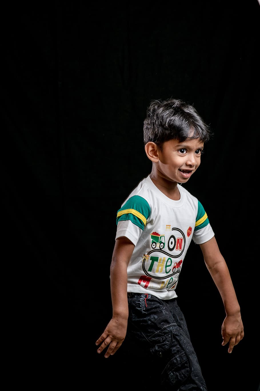 boy in black pants, child, childhood, black background, one person HD wallpaper