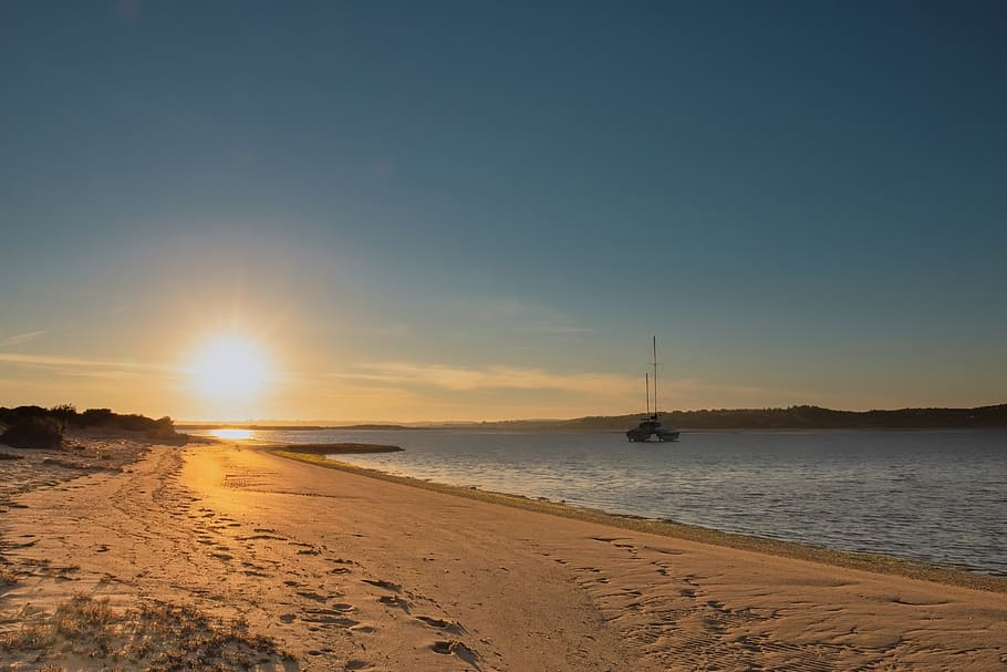 sunset, beach, boat, water, ocean, dusk, twilight, evening HD wallpaper