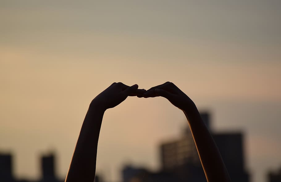 hands, silhouette, sunset, sky, focus on foreground, arms raised HD wallpaper