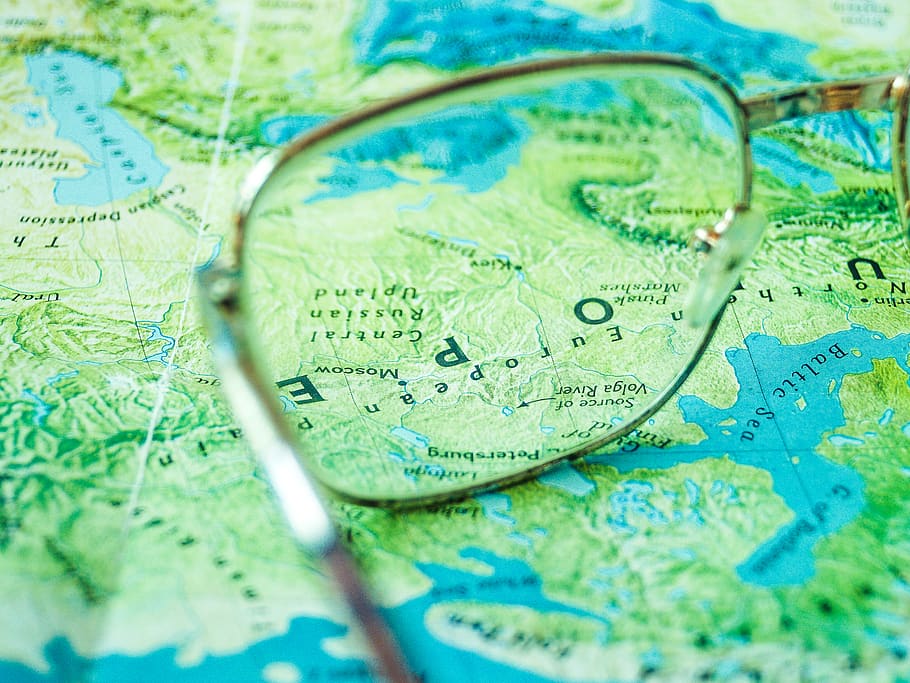 Eyeglasses on Top of Map, clear, close-up, continent, eyewear HD wallpaper
