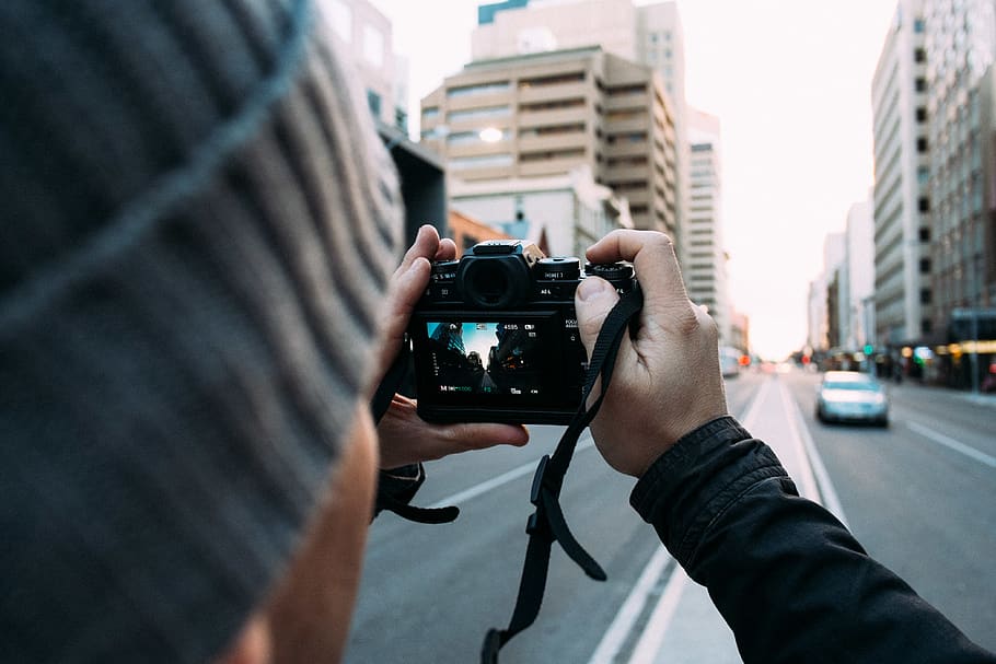 person usin DSLR camera, photography themes, city, technology HD wallpaper