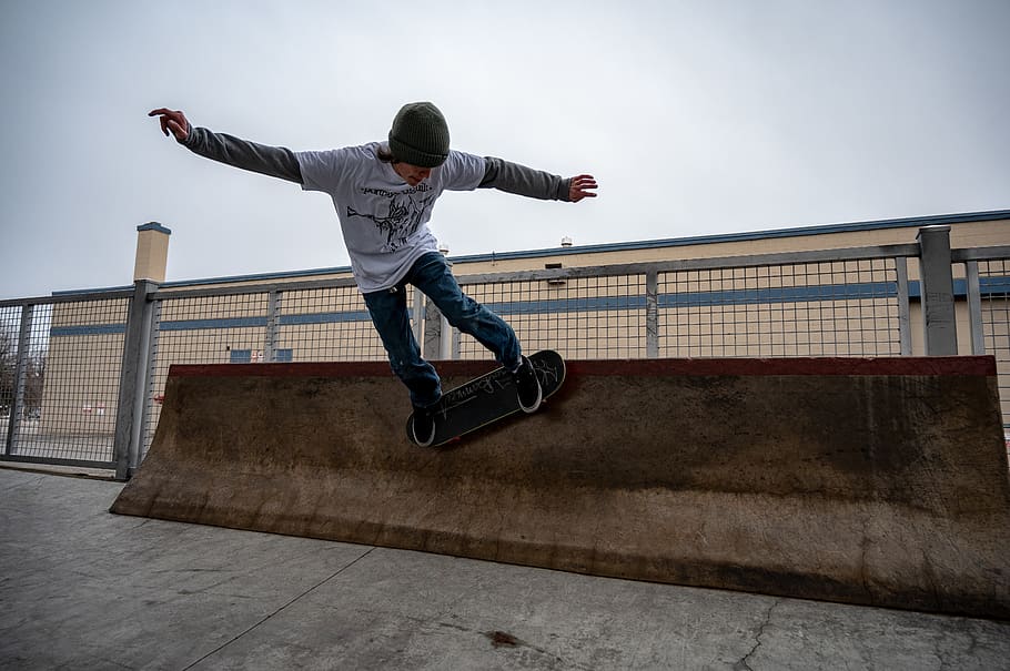 Photo of Person Skateboarding, action, adult, balance, beanie