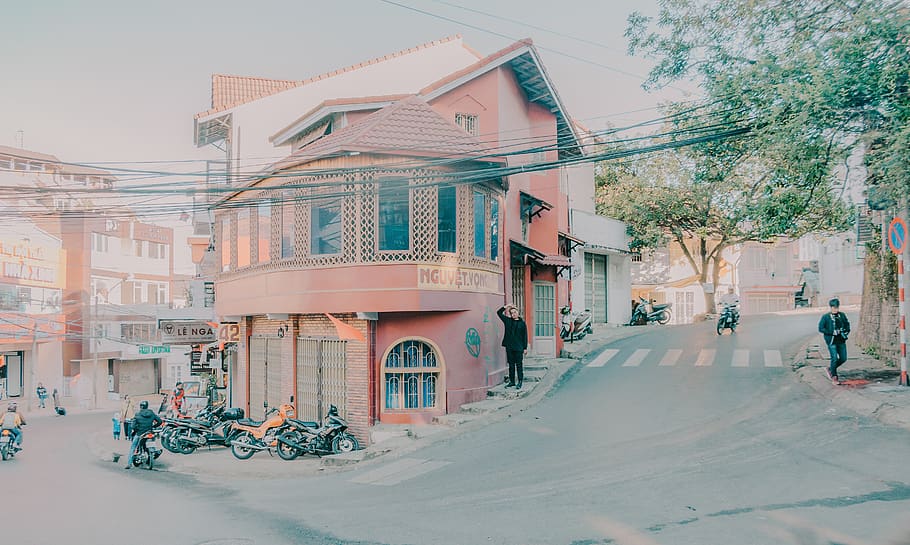 View of a Closed Store With Motorcycle Parked in Front of It HD wallpaper