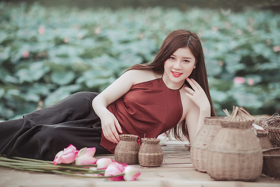 Woman Lying on Floor Near Baskets, blurred background, close-up HD wallpaper