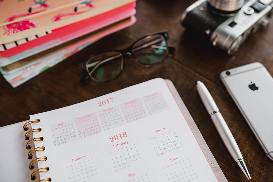 Pink calendar, notebook, diary, desk, glasses, eyeglasses, paper HD wallpaper