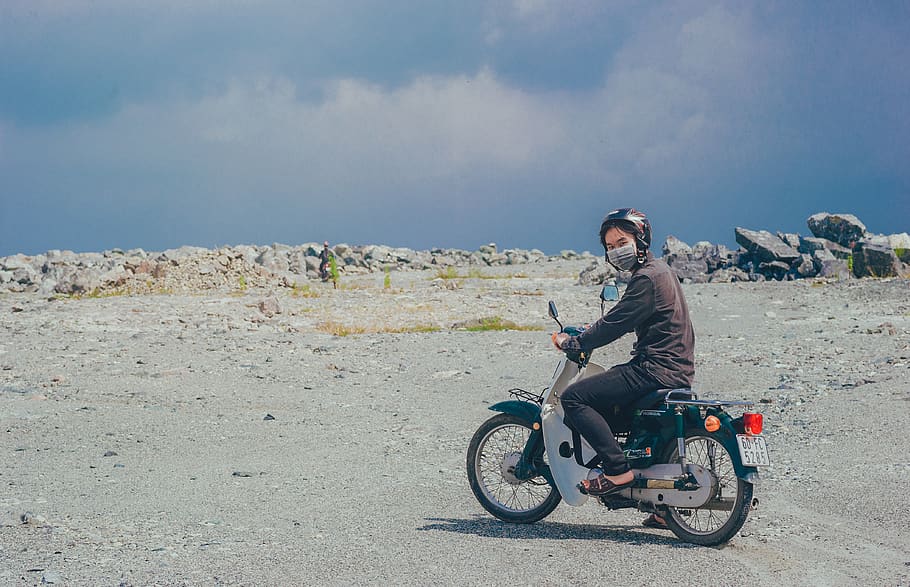 Person Wearing Mask on Motorcycle, clouds, daytime, grass, helmet HD wallpaper