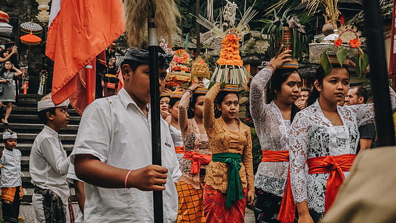 boy holding pole, human, festival, person, crowd, bali, dance pose HD wallpaper