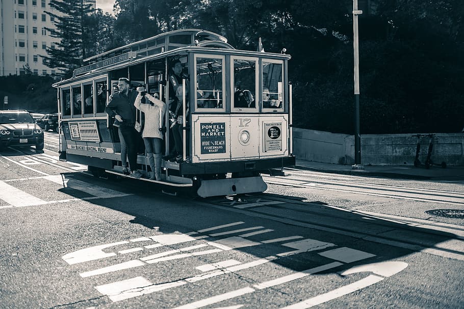 people inside the tram, rail transportation, railroad track, mode of transportation HD wallpaper