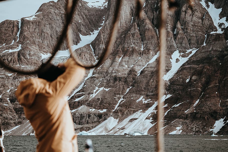 men's brown hooded jacket, outdoors, nature, person, human, mountain HD wallpaper