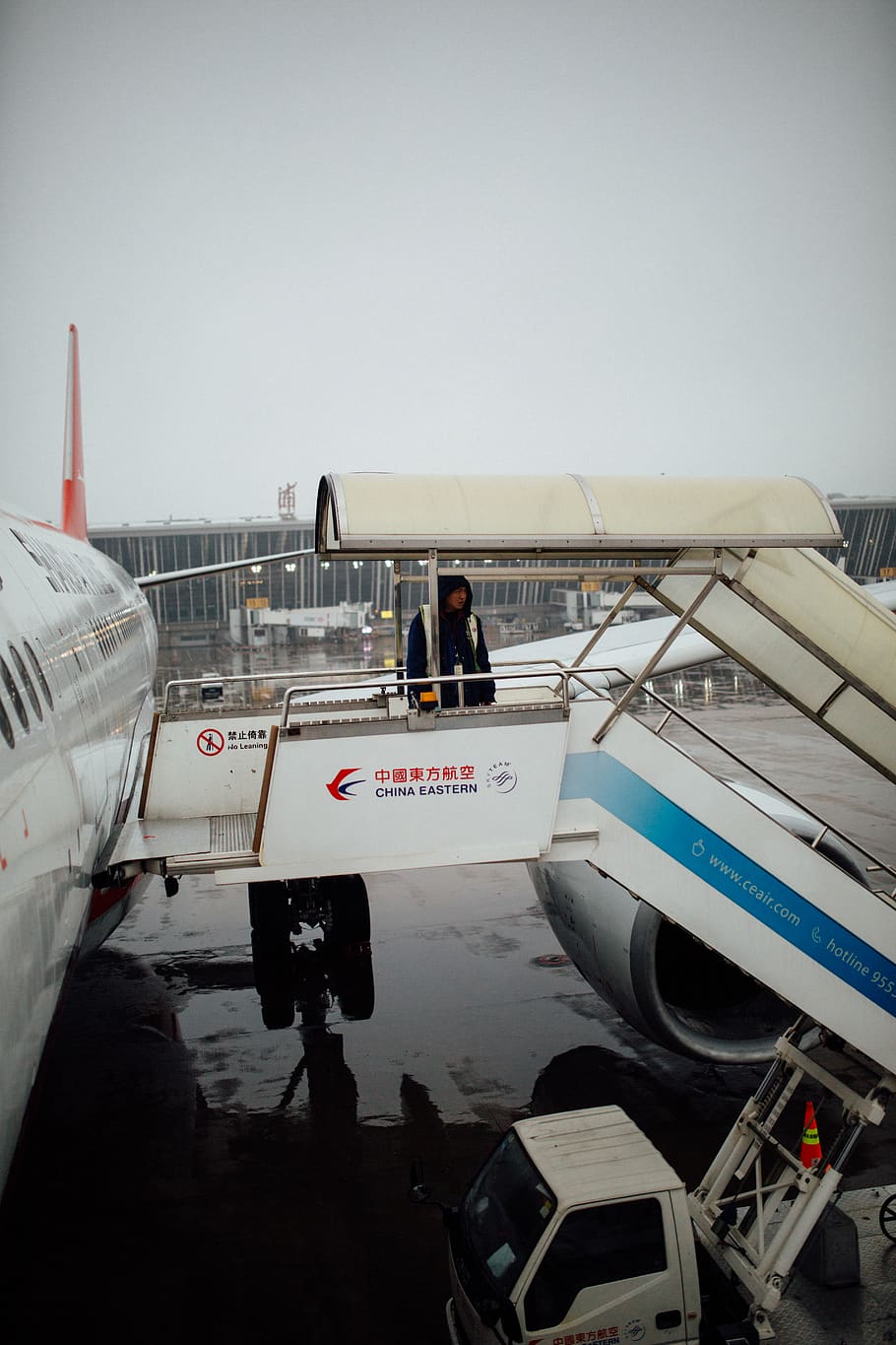 man standing on plane, airport, human, person, airfield, transportation HD wallpaper
