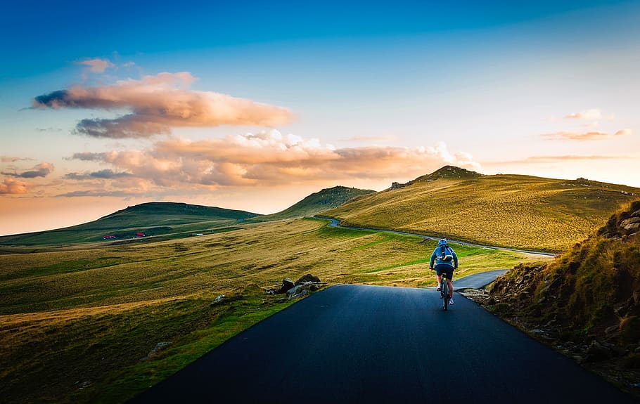Rear View of Man on Mountain Road Against Sky, adventure, bicycle HD wallpaper