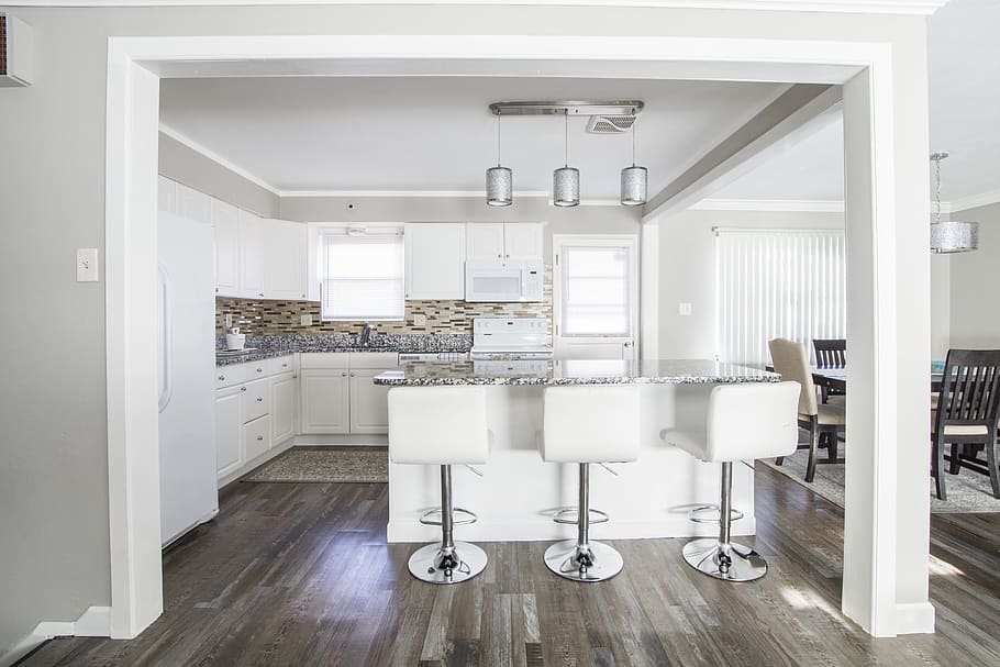 Three White Barstools in Front of Kitchen Island, ceiling, chairs