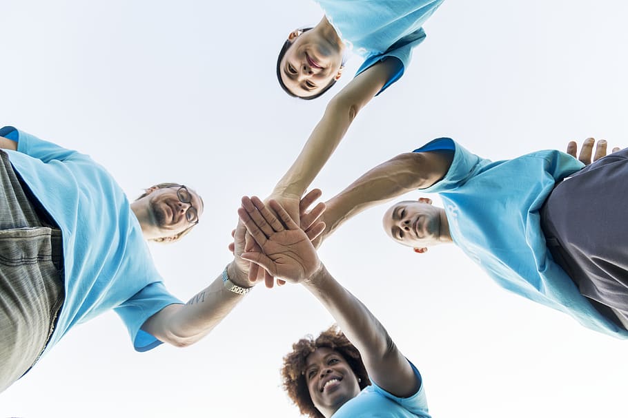 Low Angle View of People in Wearing Blue Shirts, charity, collaboration