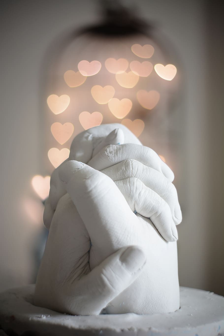 selective focus of holding hands figurine, person, human, people