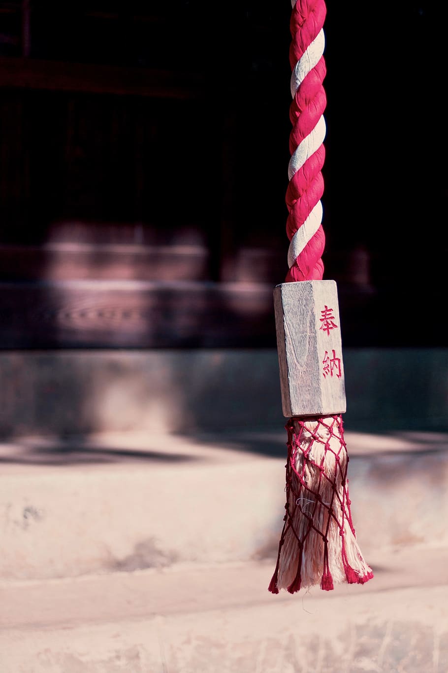 selective focus photography of white and pink rope, japan, gotokuji temple
