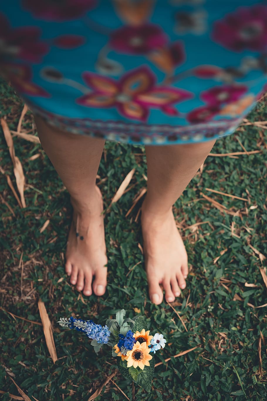 Selective Focus Photography of Person in Front of Yellow Petaled Flowers HD wallpaper