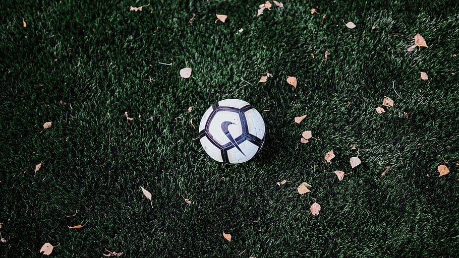 white and black Nike soccer ball, person, people, human, team sport