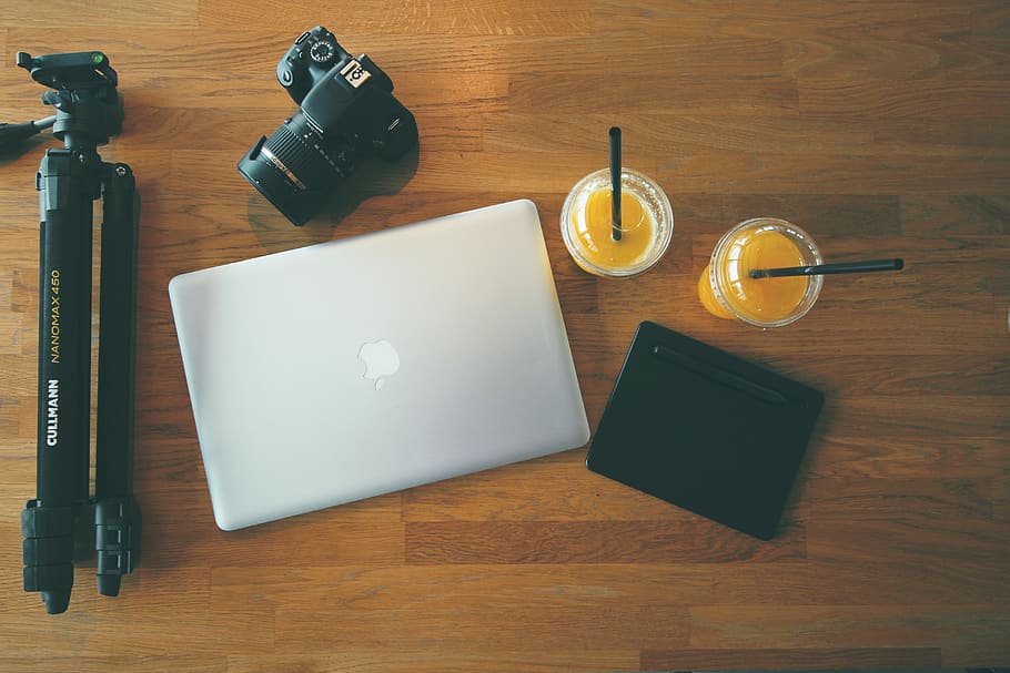 gray MacBook beside DSLR camera, nemo science museum, netherlands HD wallpaper