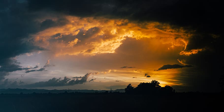 silhouette of trees under cloudy sky, sunset, dramatic, field HD wallpaper