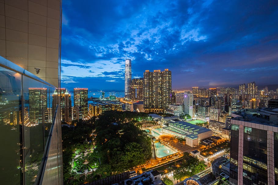 lighted high rise buildings at nighttime, railing, sky, cityscape HD wallpaper