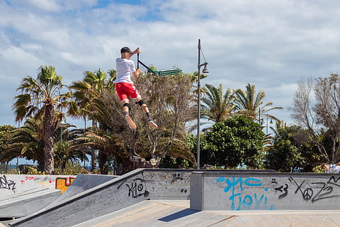 Man Doing Kick Scooter Aerial Trick on Park, action, amazing HD wallpaper