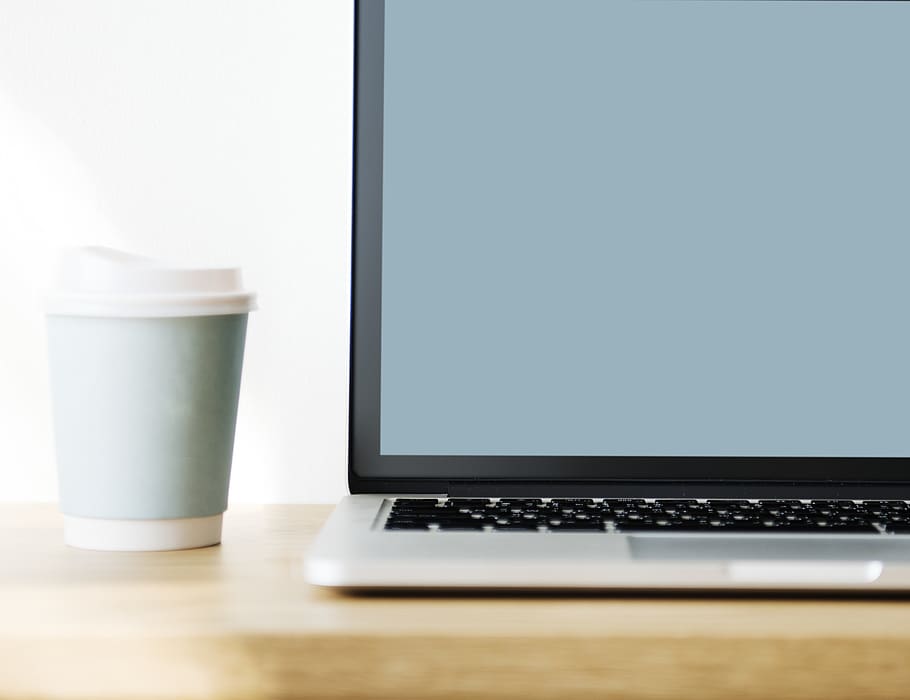 Macbook Pro Beside Drinking Cup, close-up, coffee, coffee cup HD wallpaper