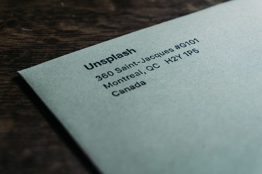 white Unsplash mail letter, text, communication, close-up, table HD wallpaper