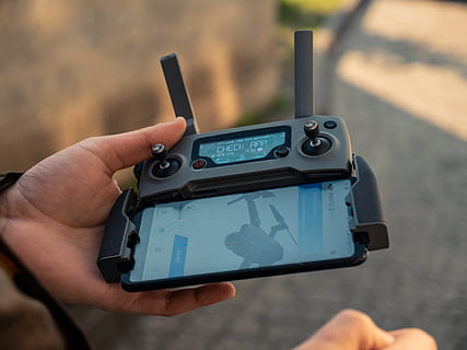 Person Holding Black Drone Controller, close-up, computer, connect HD wallpaper