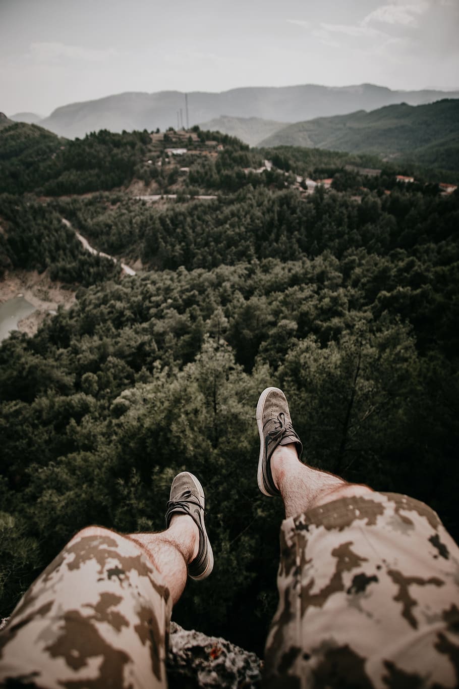 person sitting facing the forest, leg, edge, cliff, mountian HD wallpaper