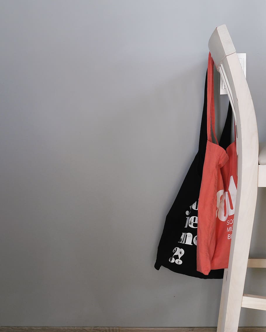 two red and black tote bags hanged on rack, ukraine, enerhetychna st, HD wallpaper