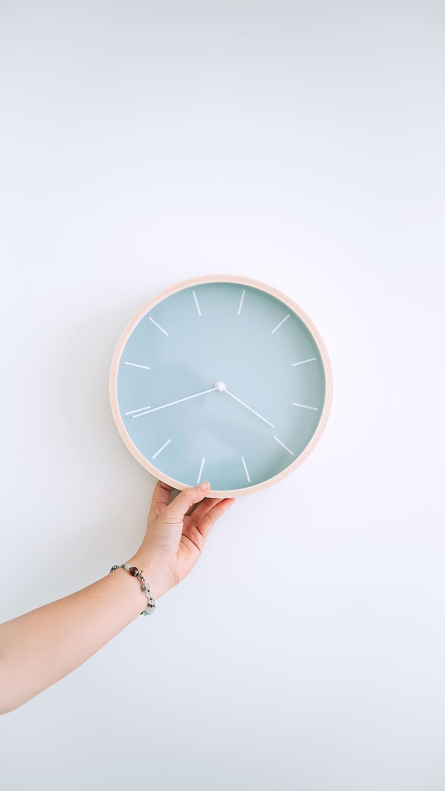 round grey wall clock, human hand, human body part, one person HD wallpaper