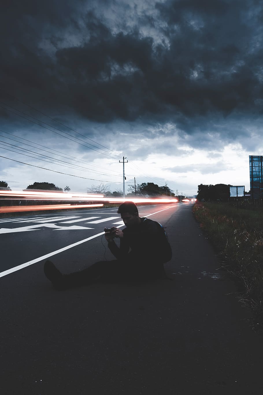 road, light, dark, cloud, sky, people, man, guy, sitting, alone HD wallpaper